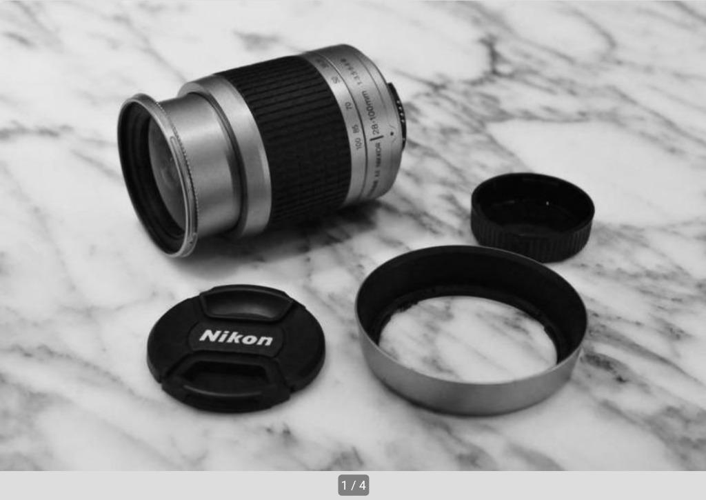 Nikon 28-100mm f3.5-5.6 AF G met zonnekap, Ophalen of Verzenden, 1980 tot heden, Lens of Lenzen