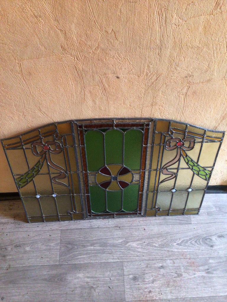 Antiek gekleurd glasraam, Ophalen