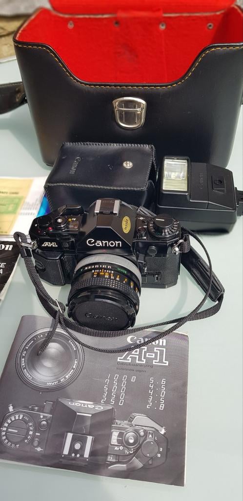 Canon A1, set avec objectif, flash et valise, Ophalen, Canon
