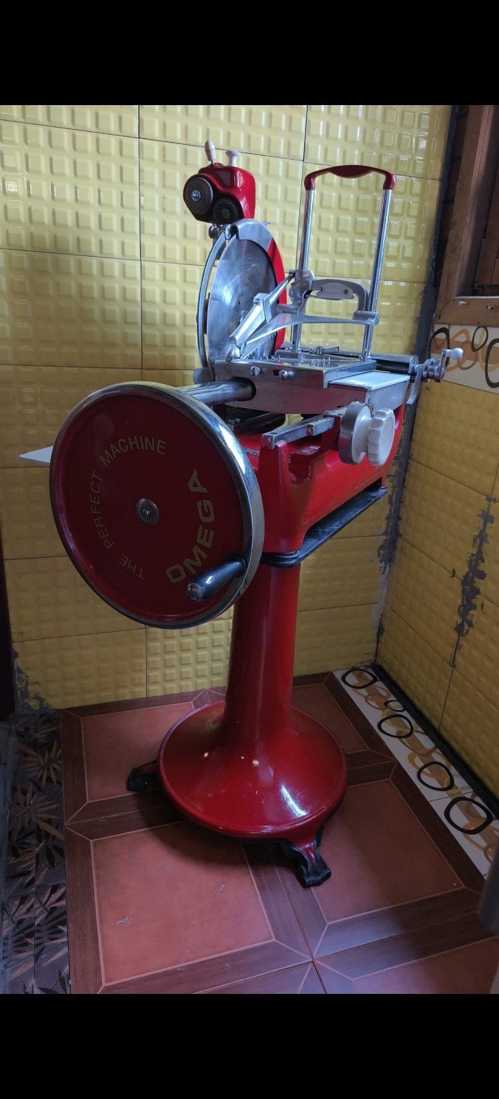 Omega snijmachine, Ophalen