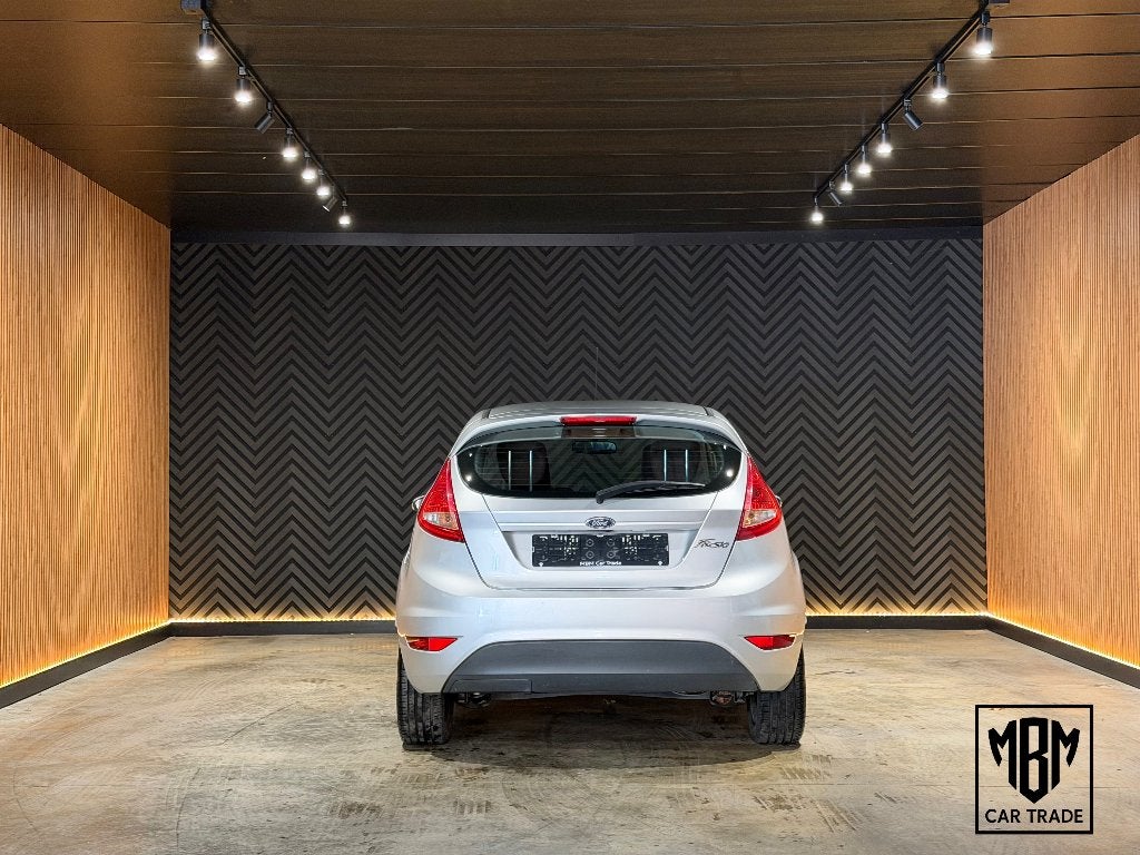 ✅ Ford Fiesta 1.25i | Airco | 12 Maanden GARANTIE | Isofix, Voorwielaandrijving, Euro 5, Stof, Bedrijf