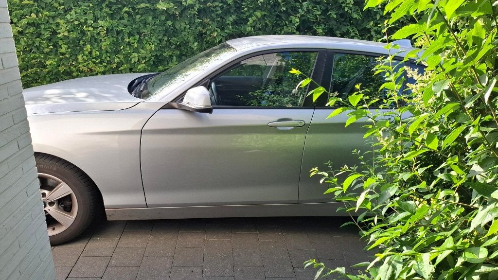 BMW 116i benzine 2016, Auto's, Euro 6, 4 cilinders, Particulier, Zilver of Grijs