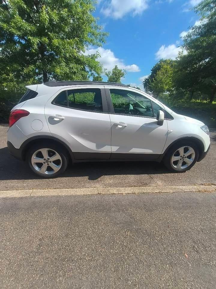 Opel Mokka 1.7 Diesel 2015, Auto's, Voorwielaandrijving, Euro 5, Stof, Zwart