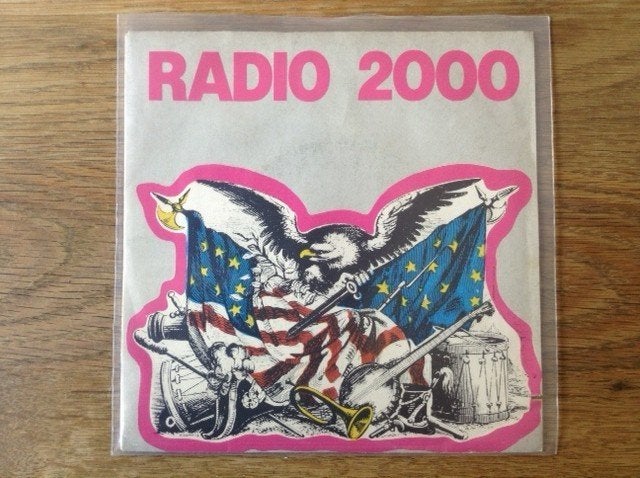 single radio 2000, Enlèvement ou Envoi, Rock et Metal, Housse de protection extérieure, 7 inch