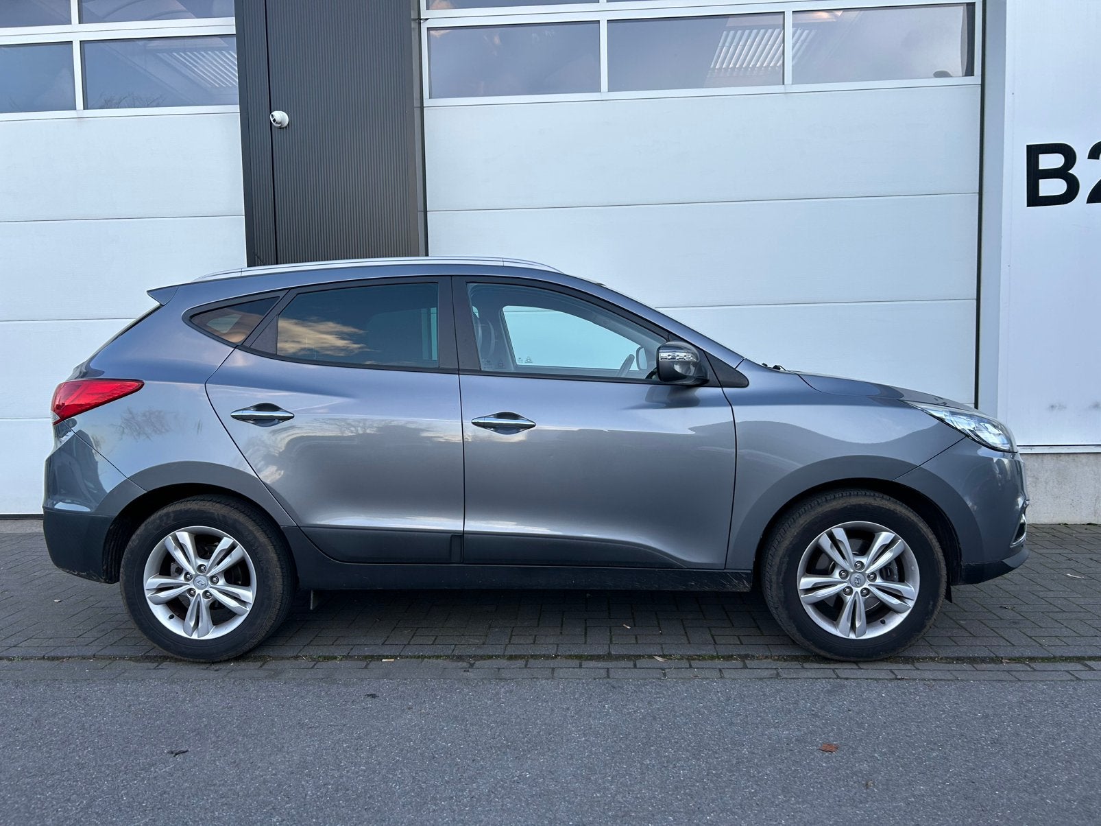 Hyundai IX35 1.6i / 77000km / 1ste eigenaar, Auto's, Zwart, Overige kleuren, Leder, Bedrijf