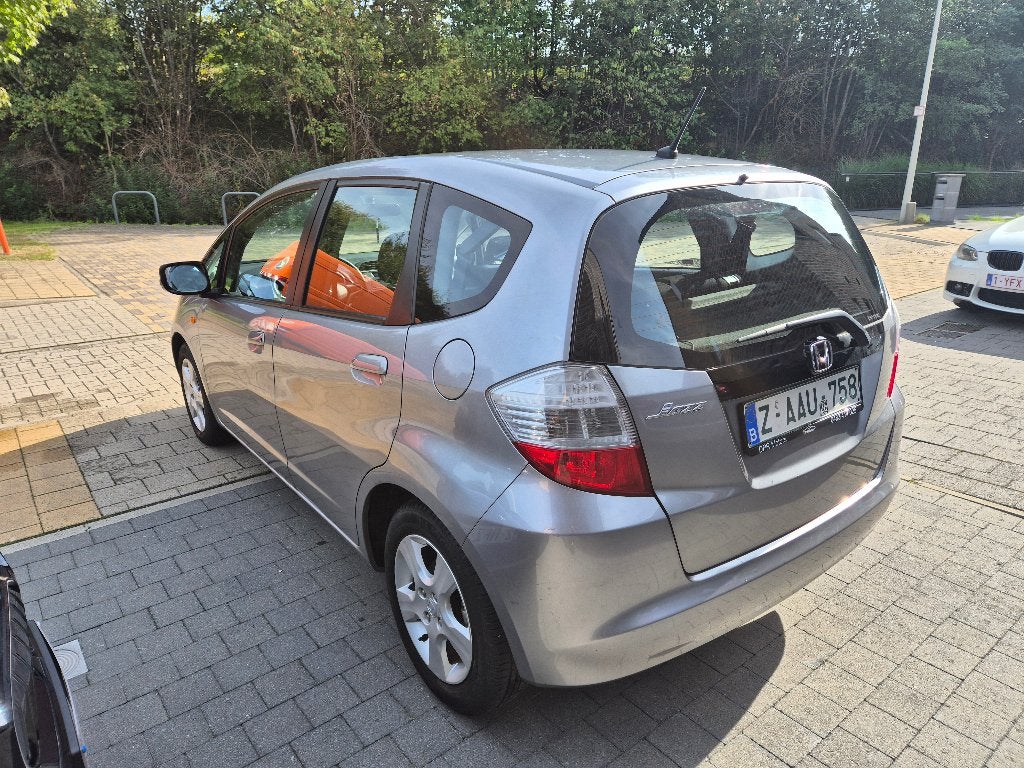 Honda Jazz 1.4i-Vtec 2009 58.000kms 1ste eig. Airco GARANTIE, Voorwielaandrijving, Dealer onderhouden, Stof, Zwart
