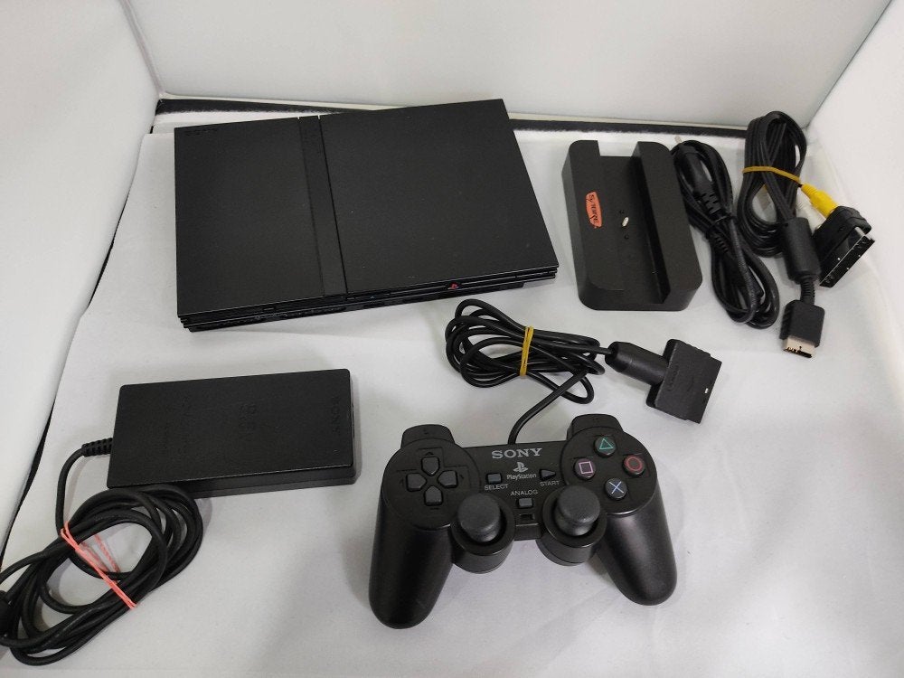 PS2 Slim Cons. (SCPH-70004) + Dualsh. 2 Contr. + enkele PS2, Gebruikt, Overige genres, 2 spelers, Ophalen of Verzenden