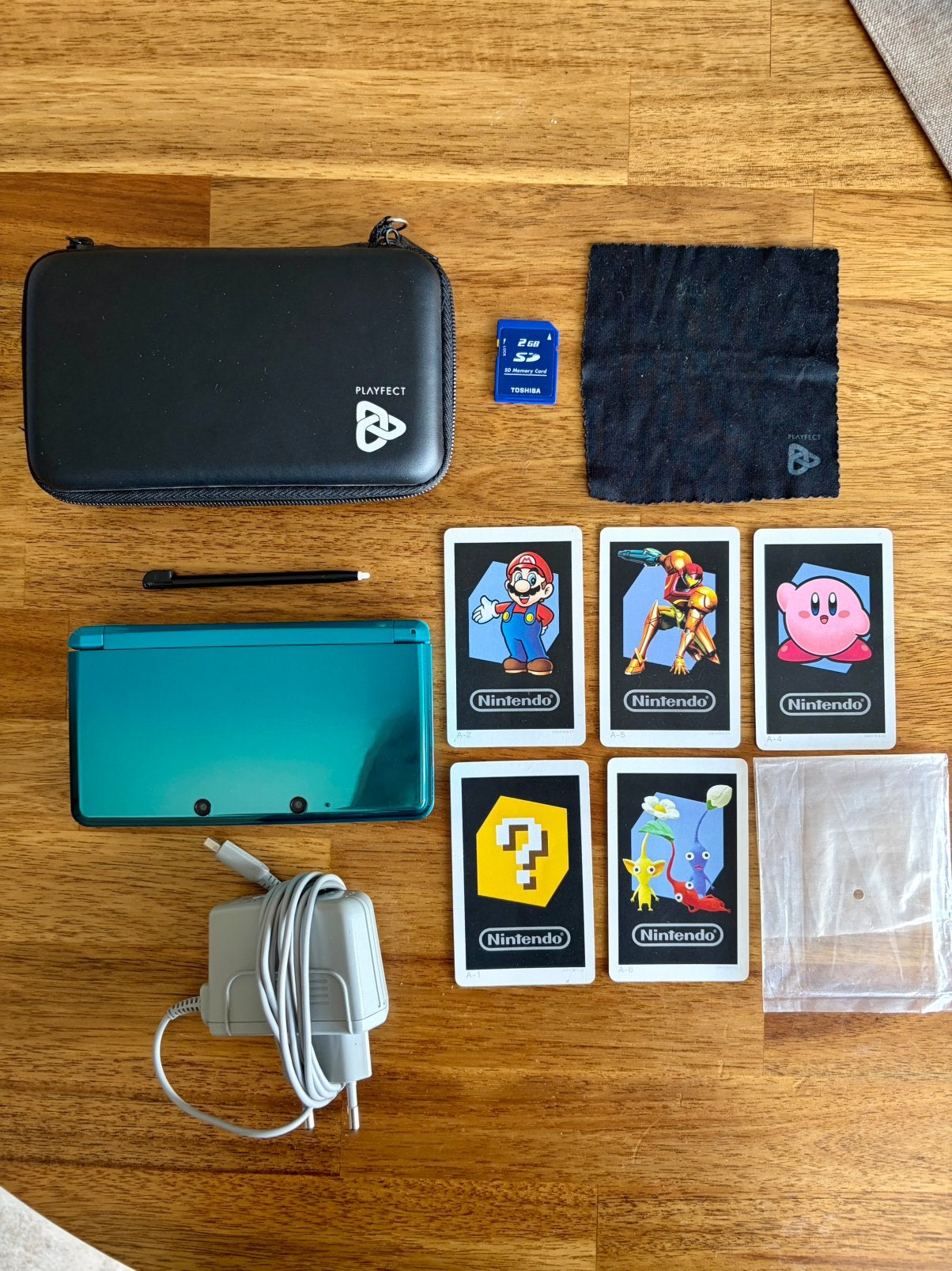 Lot Nintendo 3DS Bleu Lagon, Consoles de jeu & Jeux vidéo, Avec housse de protection ou sac, 3DS, Enlèvement, Utilisé