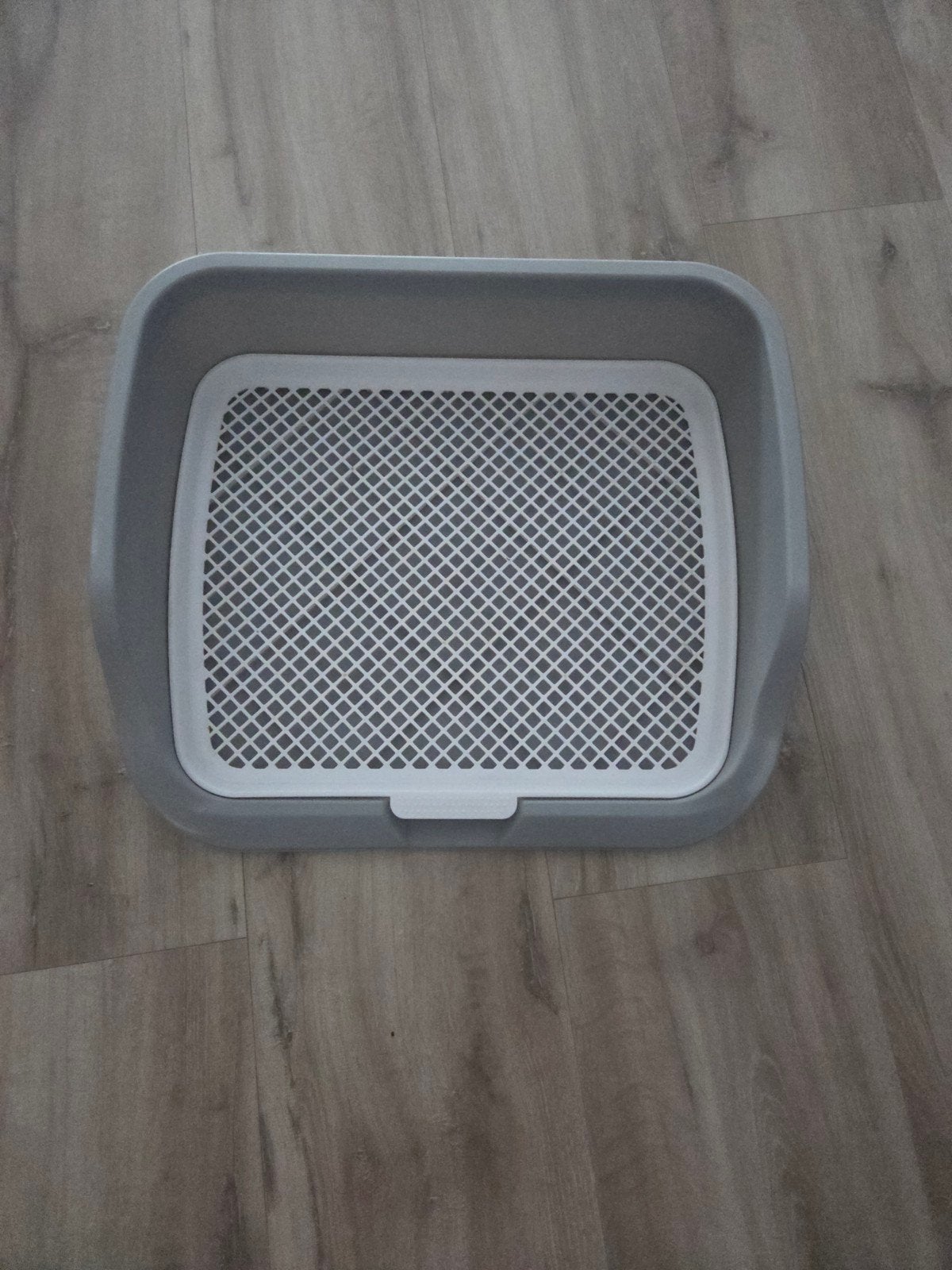 verhoogde hondenwc/trainer, Ophalen
