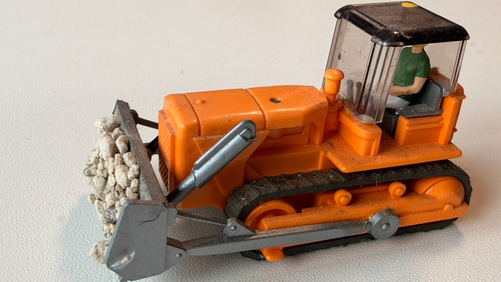 Bulldozer met bestuurder, Ophalen, Zo goed als nieuw