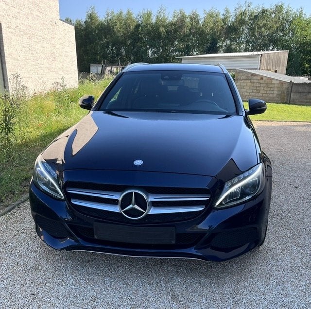Mercedes C220d Avantgarde 9G-Tronic, Auto's, Automaat, Achterwielaandrijving, Navigatiesysteem, Blauw