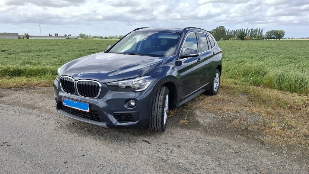 BMW X1 sDrive 18i, Auto's, BMW, Stof, Euro 6, Blauw, 5 zetels