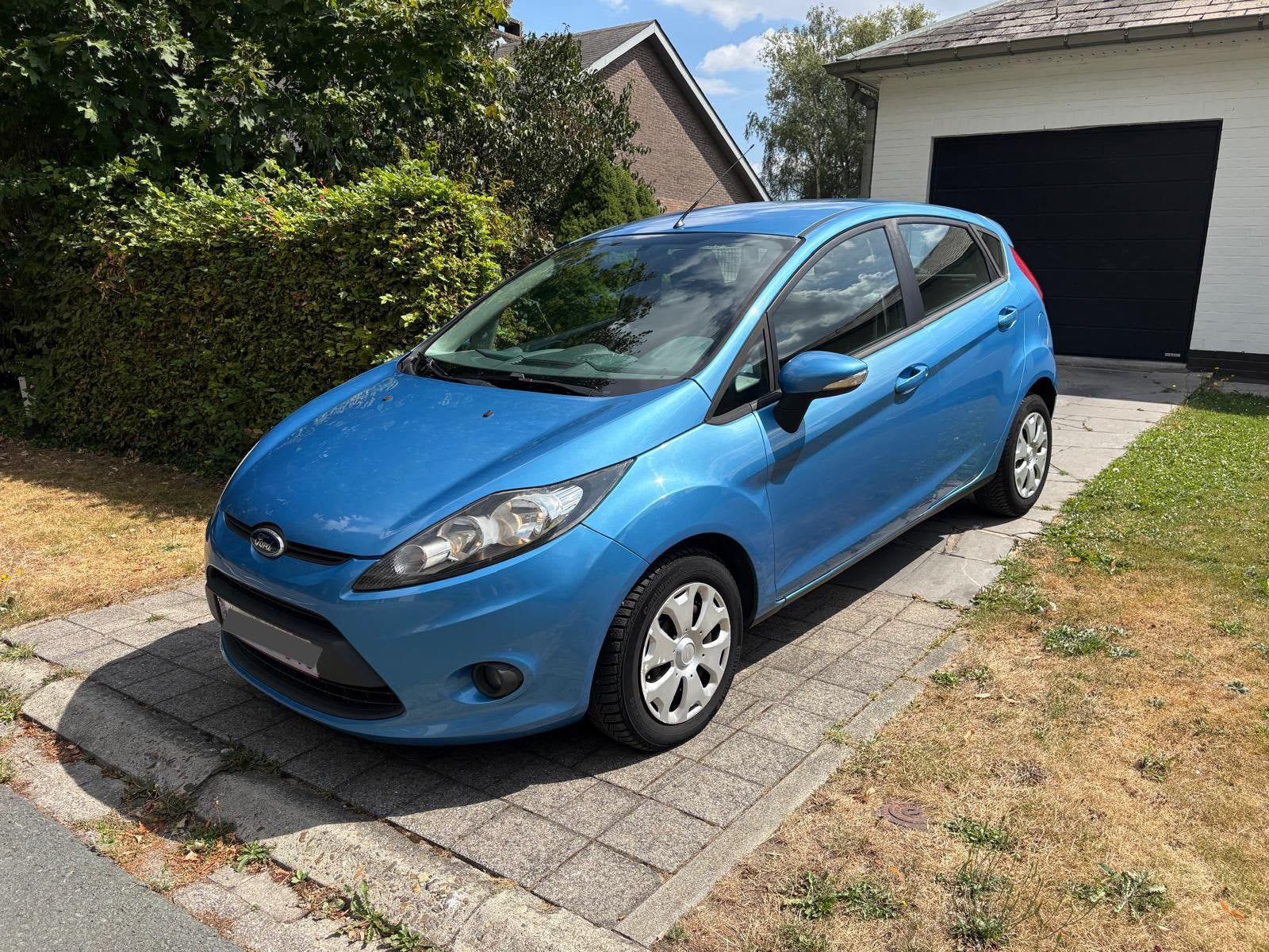 Ford Fiesta 1,25 — 92.000 km — Volledig onderhoudsboekje, Auto's, Voorwielaandrijving, 1242 cc, Blauw, Particulier
