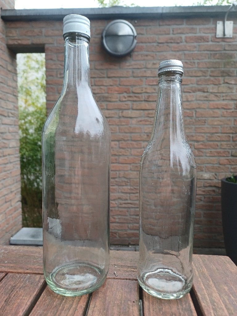 Flessen van 1 liter en 50 g. Sap/siroop. Leeg, schoon, Ophalen of Verzenden, Zo goed als nieuw, Glas