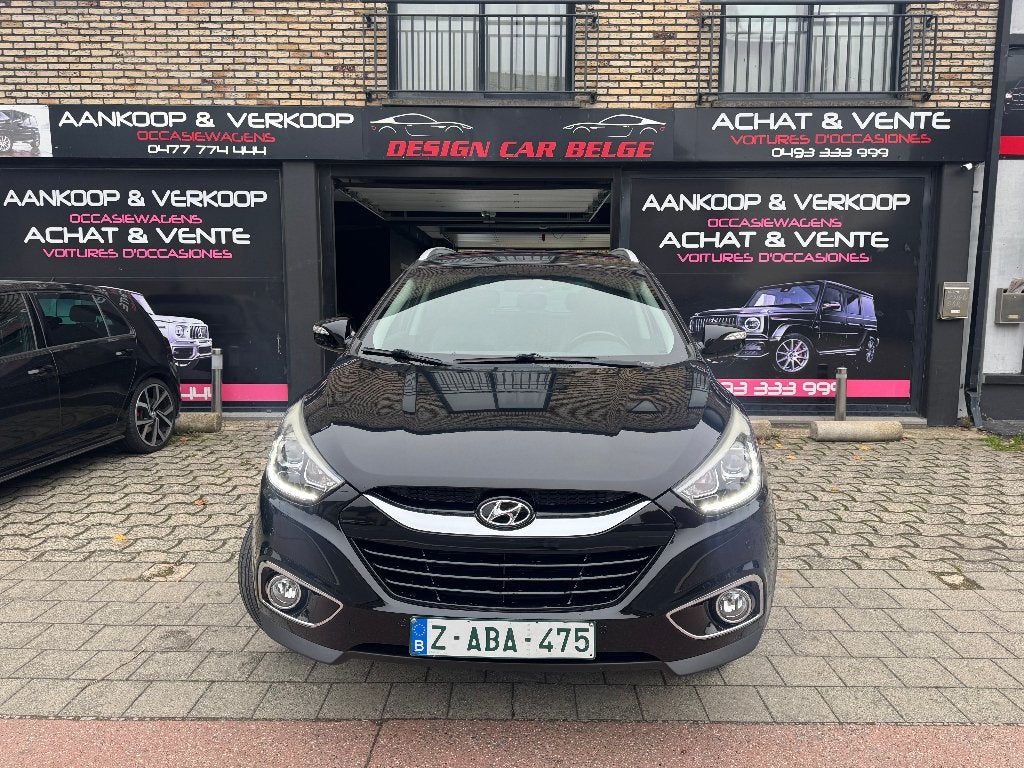 Hyundai iX35 4x2 1.6 GDi 134 ch Cosmo 1ère main Navigation, Autos, Euro 5, Entreprise, Noir, 5 portes