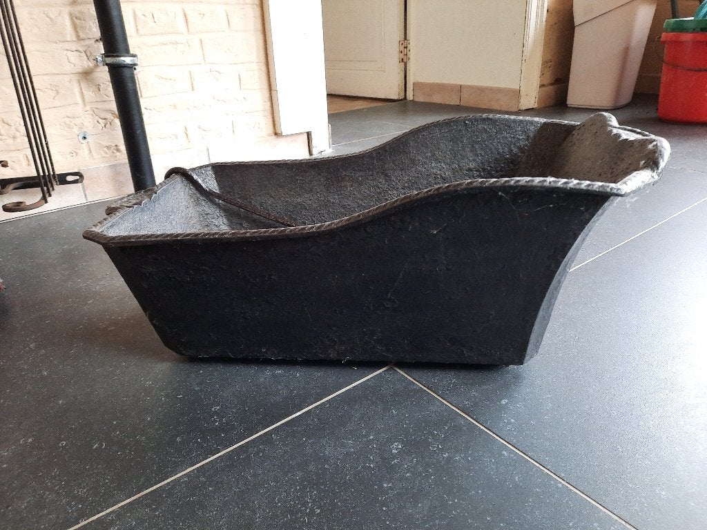 gietijzeren kolenbak, Ophalen