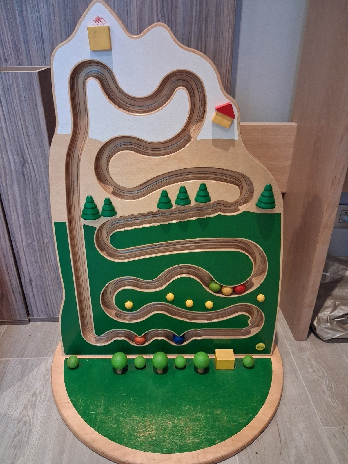 houten knikkerbaan, Ophalen
