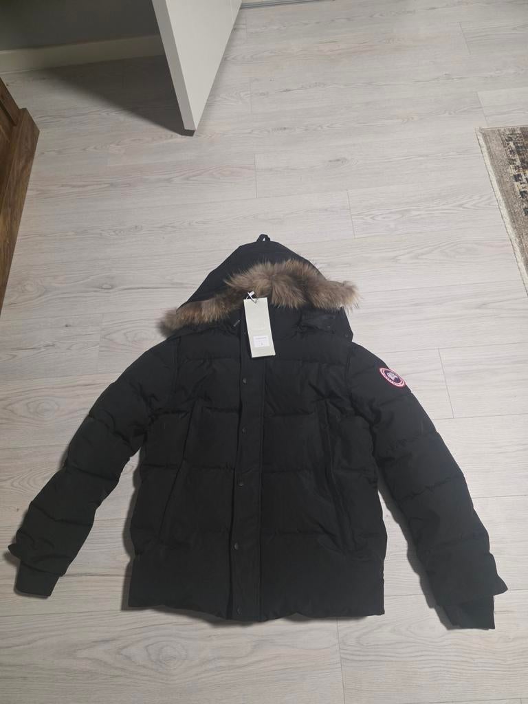 Canada goose jas, Ophalen
