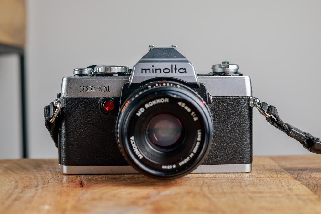 Minolta XG-1 35mm SLR + Rokkor 45mm f/2, Audio, Tv en Foto, Fotocamera's Analoog, Ophalen of Verzenden, Zo goed als nieuw, Spiegelreflex