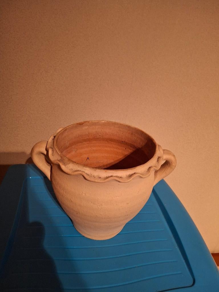 Terracotta vaas, Ophalen