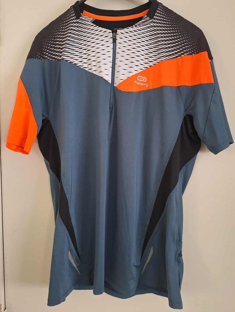 Mooi grijs en oranje Kalenji T-shirt. Maat XL, Maat 56/58 (XL), Zo goed als nieuw, Hardlopen of Fietsen, Grijs