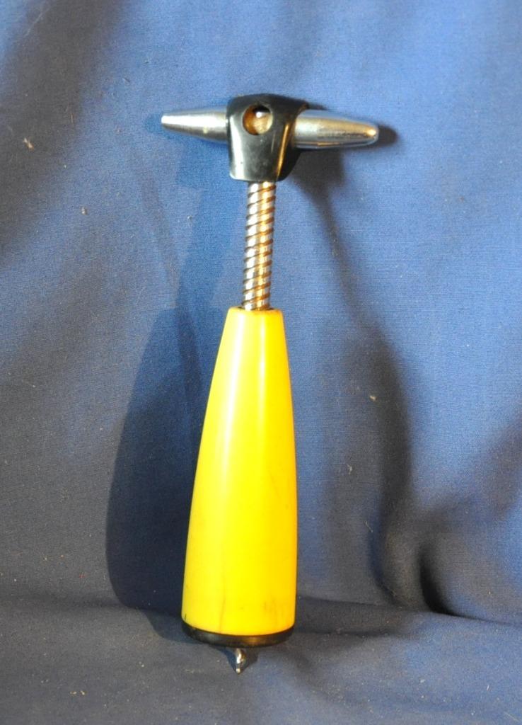 tire bouchon vintage plastique jaune et metal, Enlèvement ou Envoi
