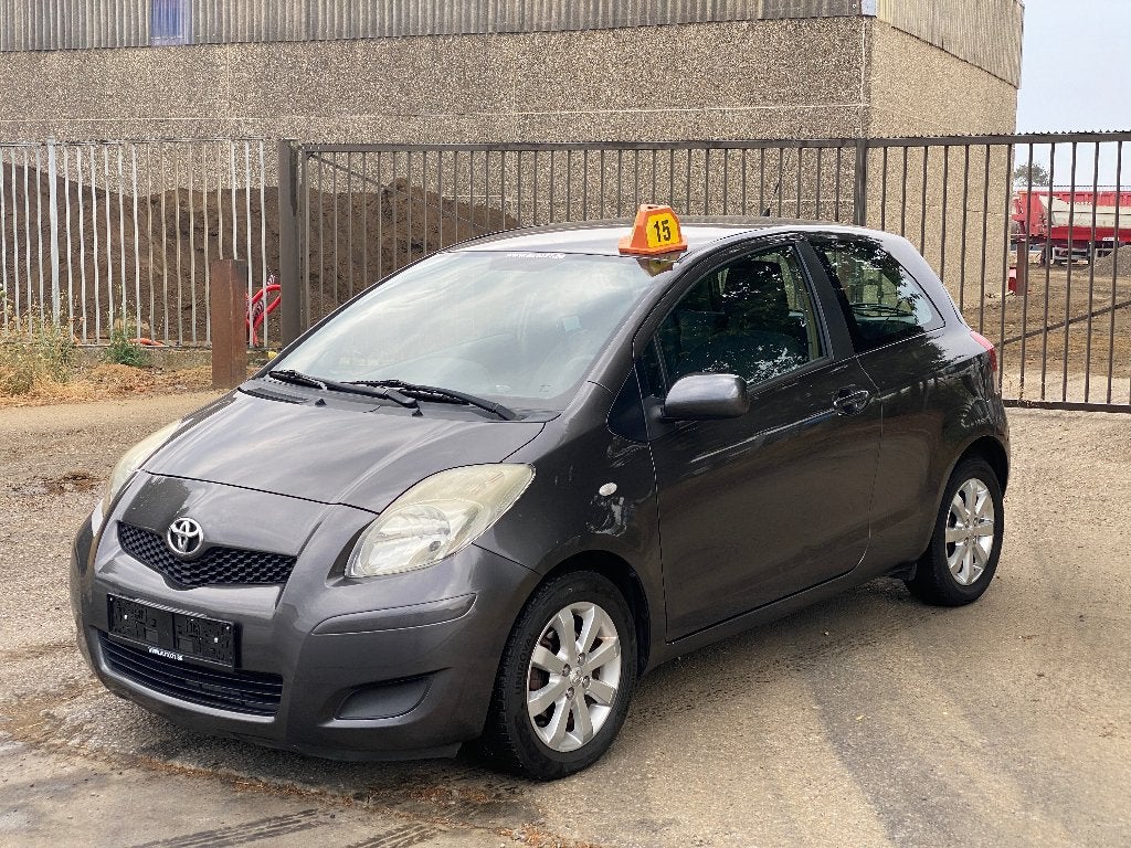 Toyota Yaris 1.33i VVT-i Luna, Auto's, Dealer onderhouden, Stof, Zwart, 4 cilinders