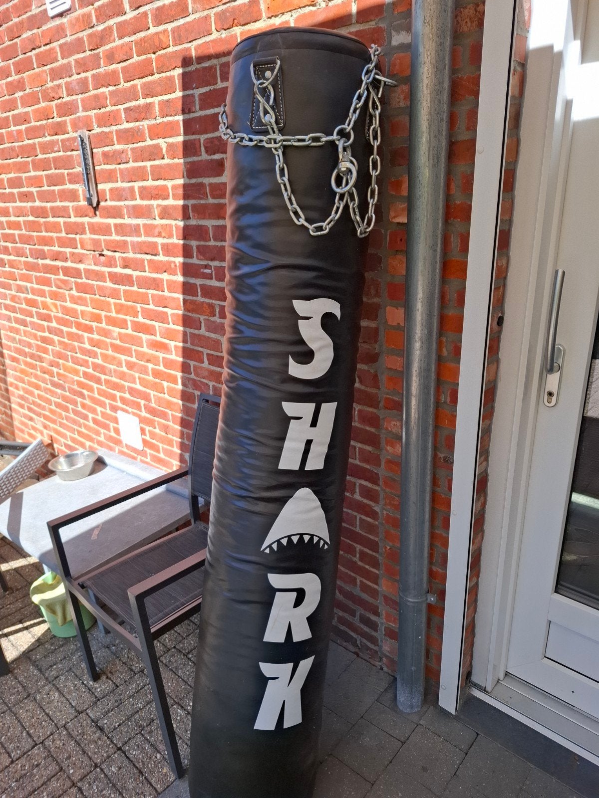 Profesionele Bokszak shark., Ophalen