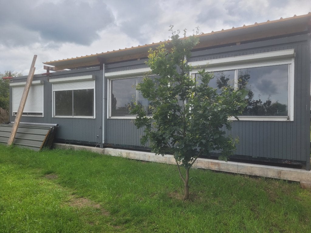 Woonunit bestaande uit 4 bureelcontainers, Enlèvement