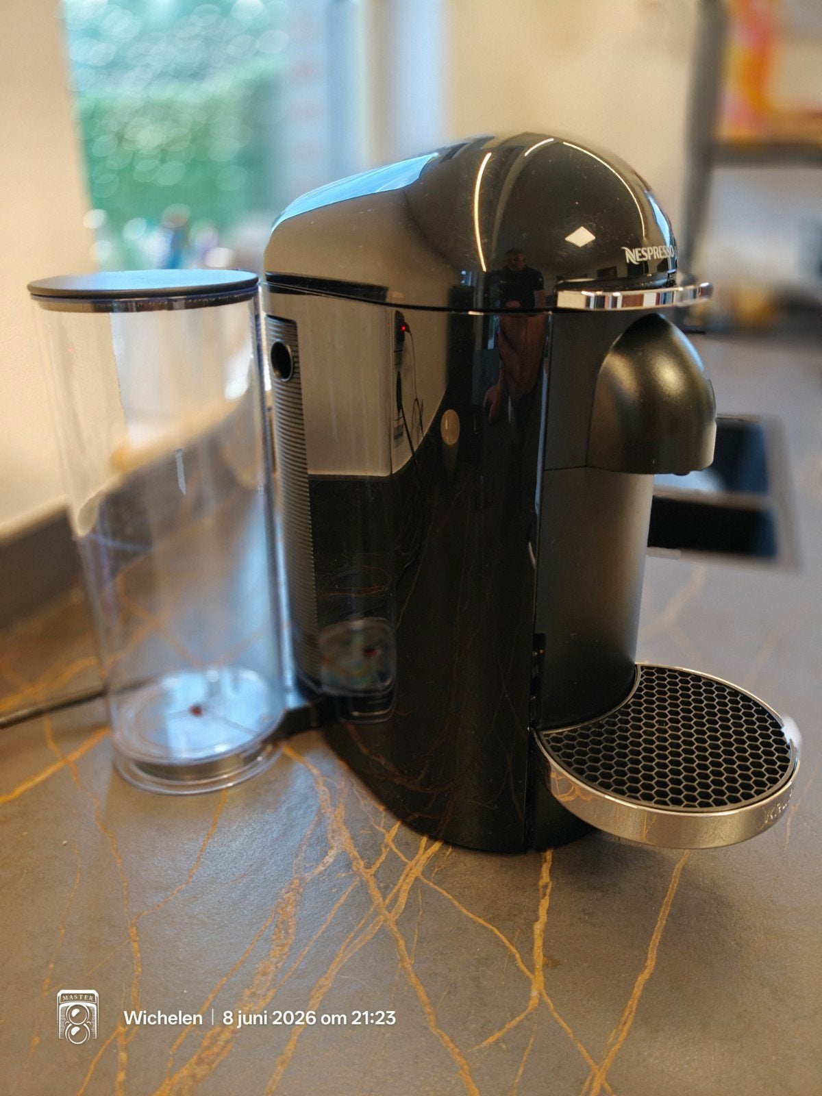 Nespresso vertuo plus van Krups, Ophalen