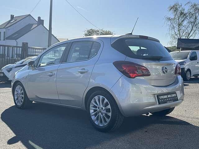 Opel Corsa 1.4i Cosmo AUTO / AIRCO / BLUETOOTH / NAV / PDC, Auto's, Automaat, 139 g/km, 65 kW, Parkeersensor