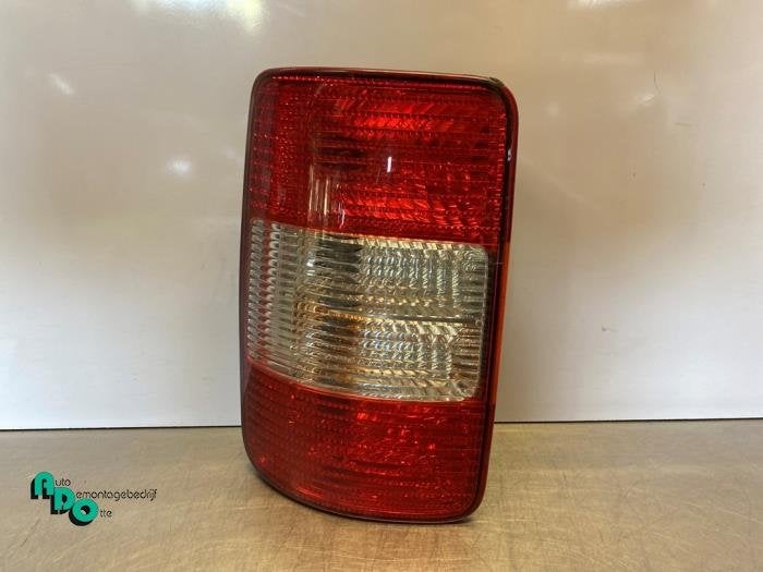 Achterlicht links van een Volkswagen Caddy (Caddy 04-), Gebruikt, -, Volkswagen, -