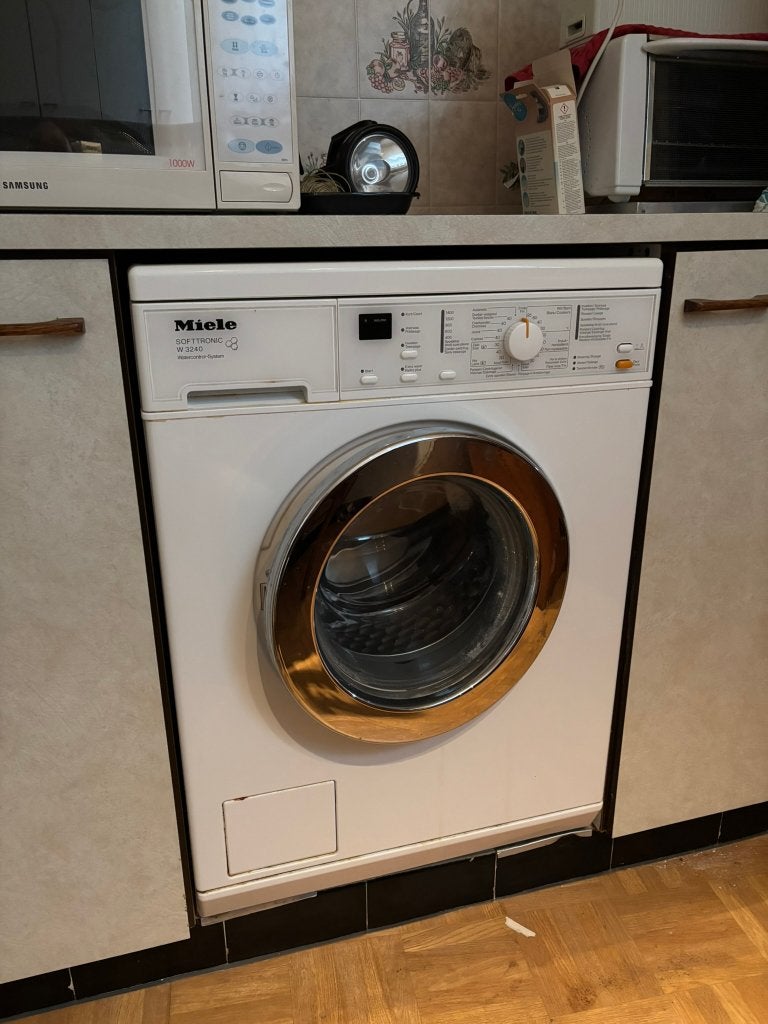 Miele Softronic W3240 wasmachine, Enlèvement