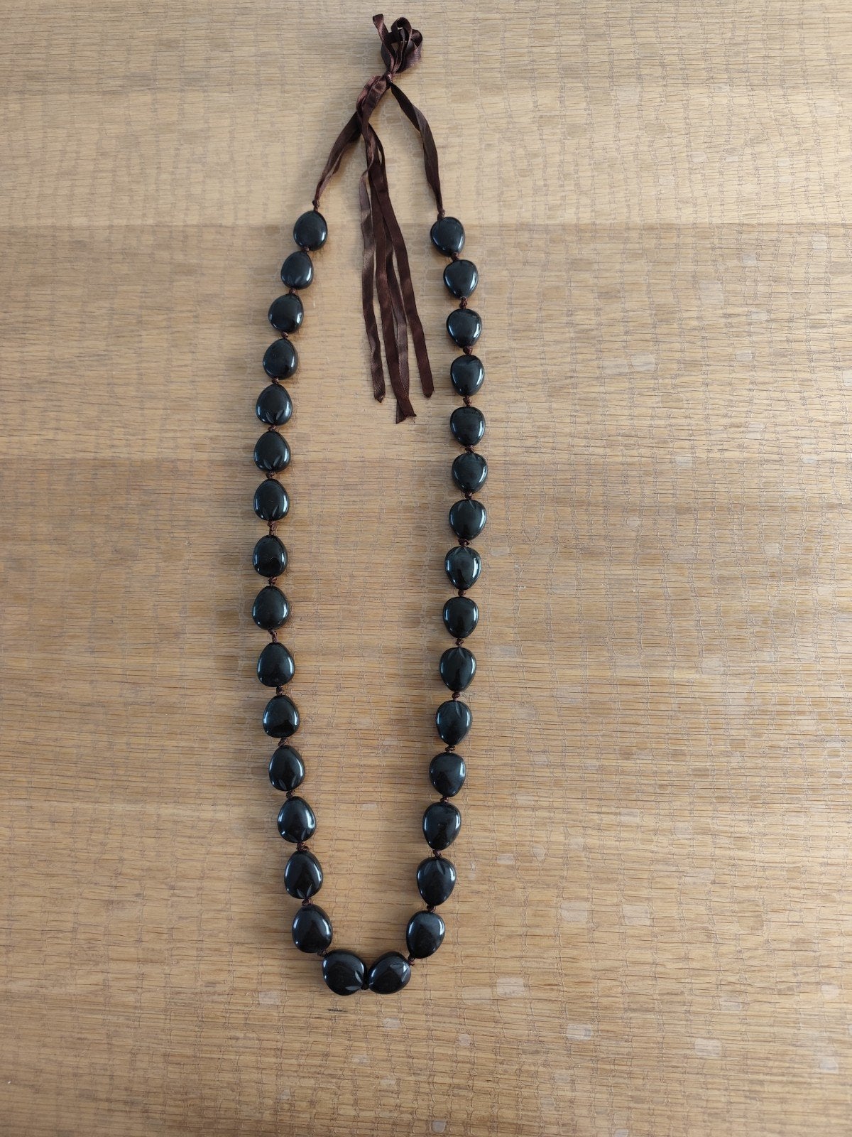 très long collier a grosses perles marron très foncé., Ophalen of Verzenden, Nieuw, Bruin, Verstelbaar