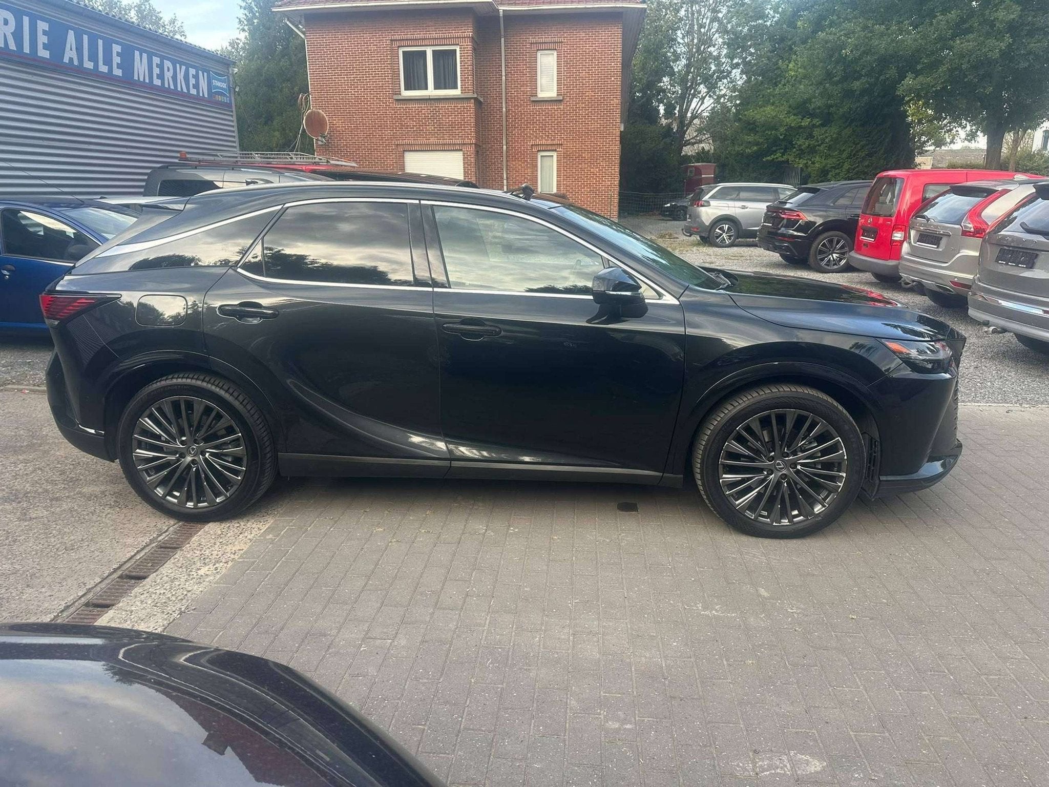 Lexus RX 450h RX 450h 2.5i V6 Anniversary Edition (bj 2023), Auto's, 183 kW, Zwart, Bedrijf, Hybride Elektrisch/Benzine