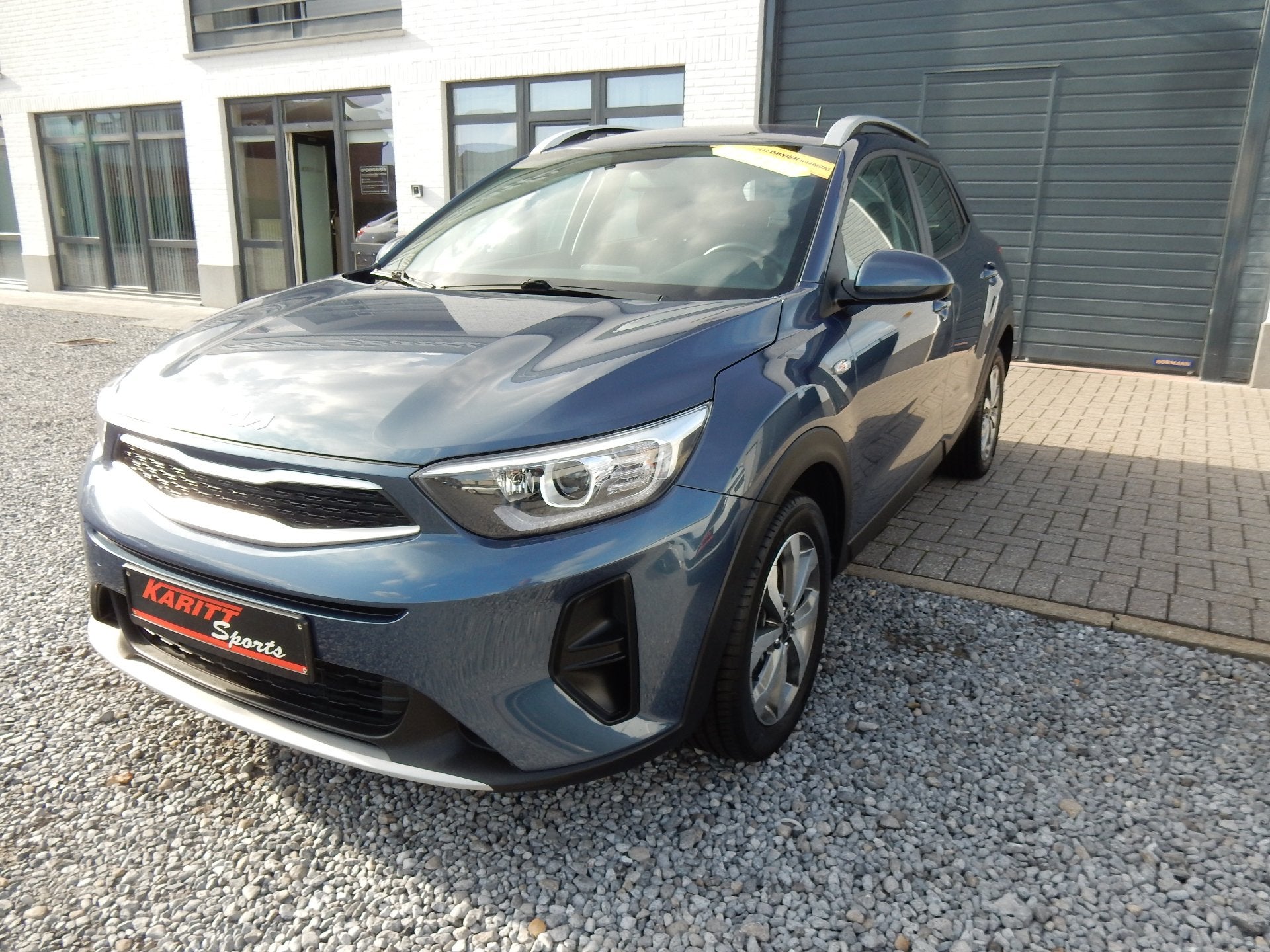 Kia Stonic 100pk ! 56000km ! (bj 2023), Auto's, Stof, Overige kleuren, Bedrijf, Grijs