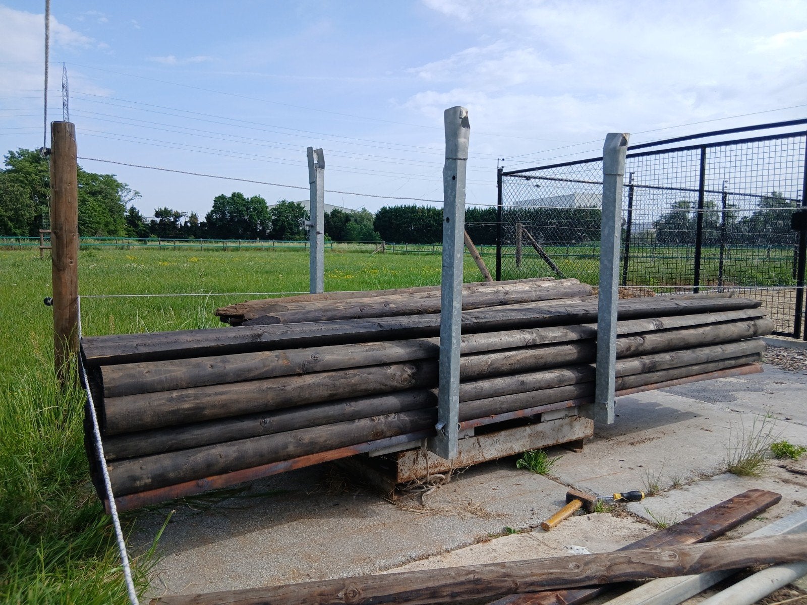 Gecreosoteerde palen en dwarsliggers omheining, Enlèvement