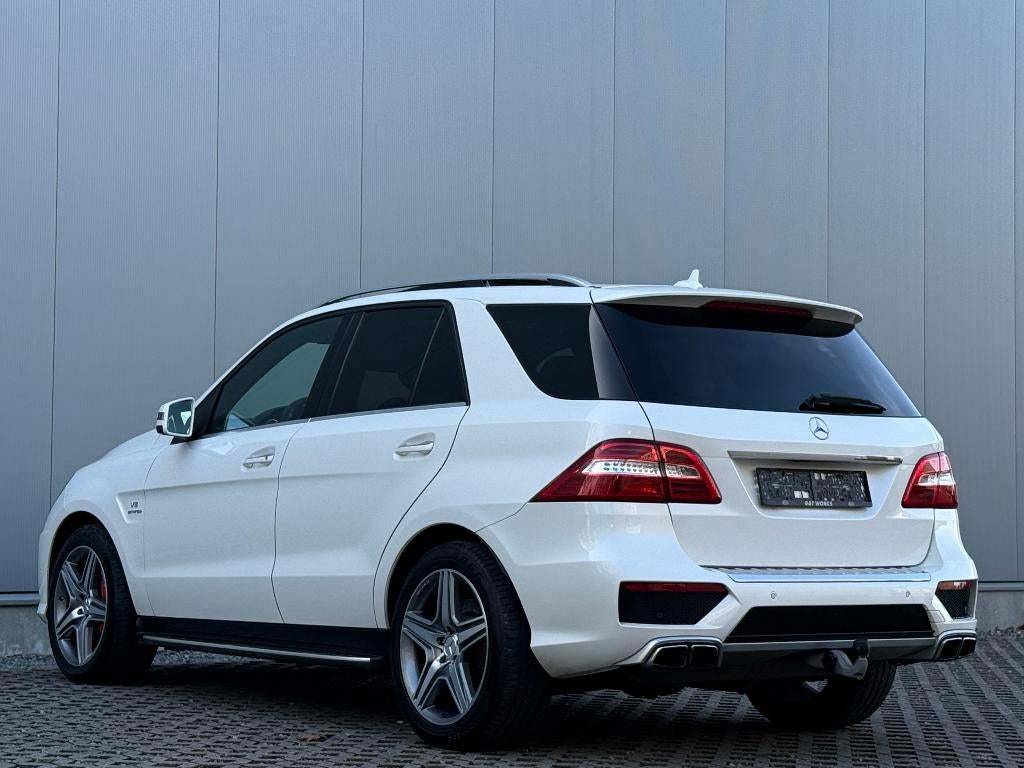 Mercedes ML 63AMG V8 557PK LichtevrachtMetZetels Veel Opties, Auto's, Automaat, 276 g/km, Wit, Leder