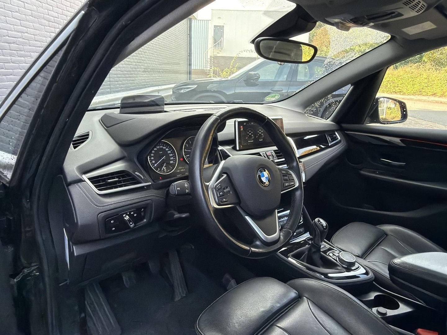 BMW 218 Active Tourer 2-serie 218i High Executive | Leder |, Autos, Achat, Entreprise, Boîte manuelle, Noir