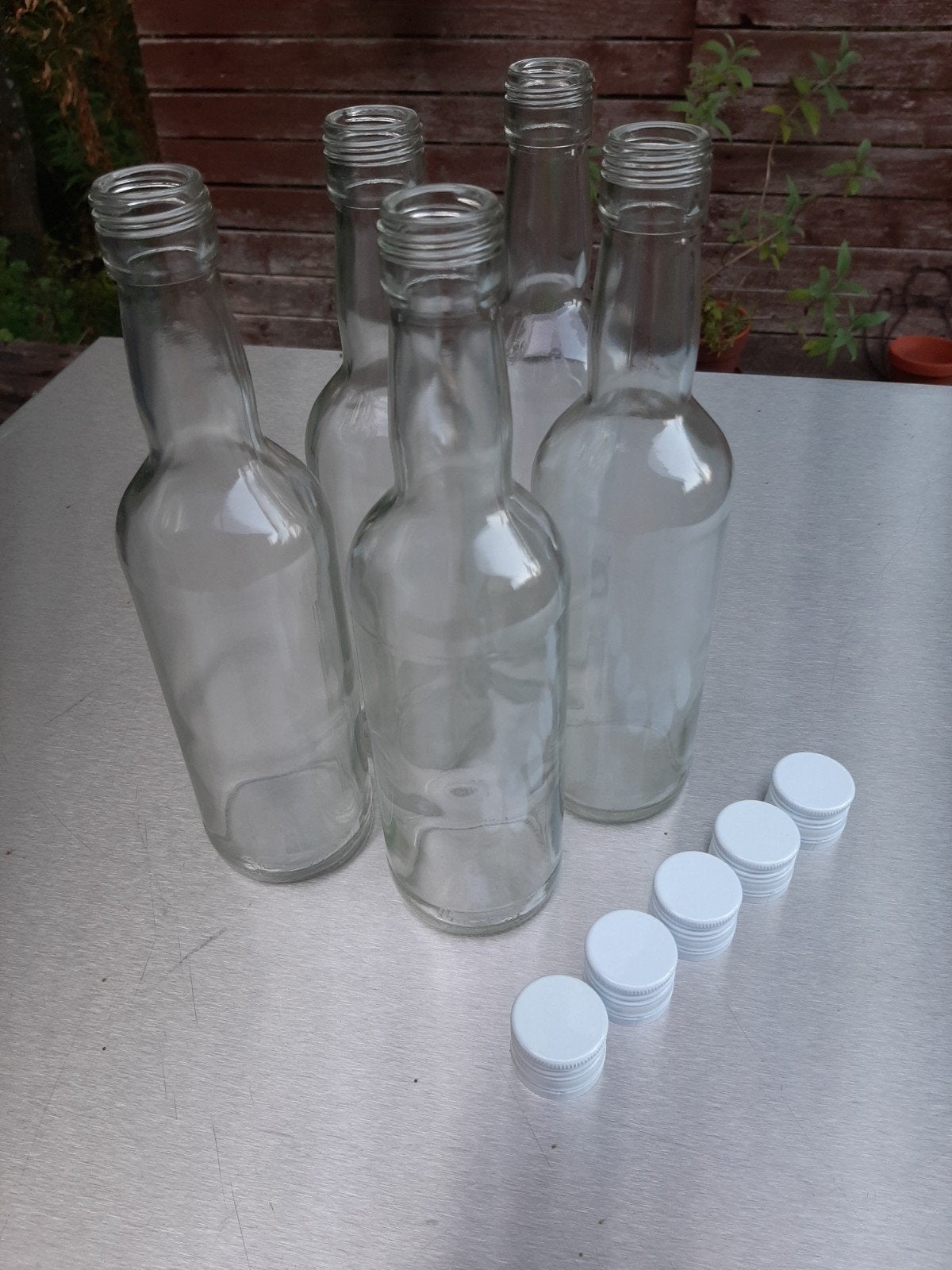 5 transparante en nieuwe flessen met schroefdop, Huis en Inrichting, Keuken | Servies, Overige merken, Klassiek, Nieuw, Ophalen of Verzenden