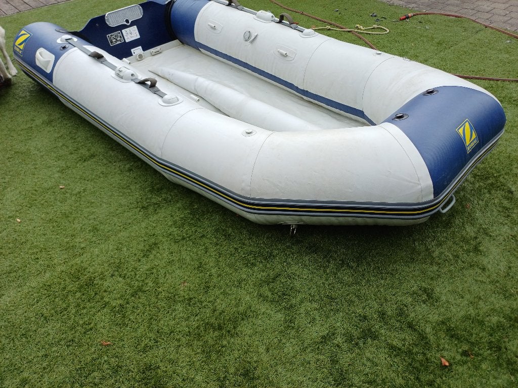 Rubberboot zodiac s310, Sports nautiques & Bateaux, Canots pneumatiques, Utilisé, Zodiac, Bois, Sac de rangement, Pompe, Essence