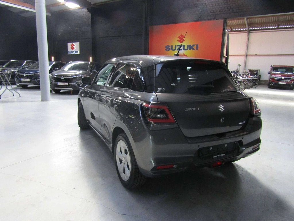 Suzuki Swift Swift 1.2i SHVS Grand Luxe + (bj 2025), Auto's, Stof, Gebruikt, Swift, 1365 kg