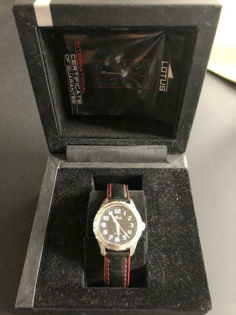 Lotus horloge 15657/6, Enlèvement ou Envoi, Utilisé, Noir, Garçon ou Fille