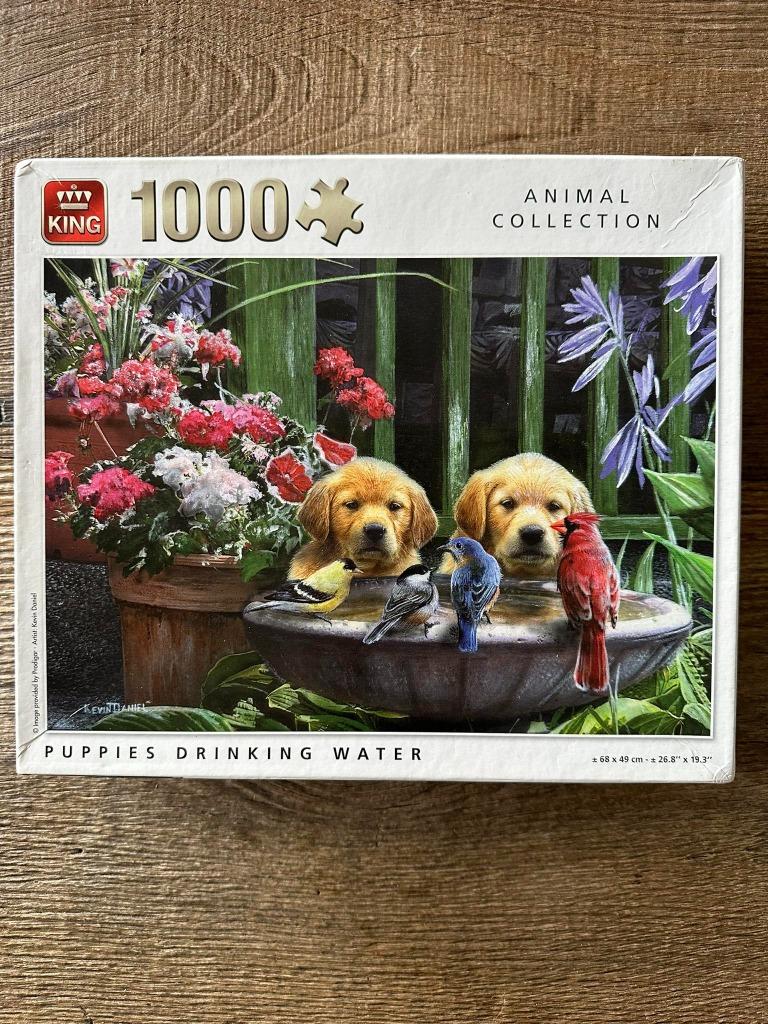 King puzzel 'Puppies drinking water' 1000 stukjes, Hobby en Vrije tijd, Ophalen of Verzenden, 500 t/m 1500 stukjes, Gebruikt, Legpuzzel