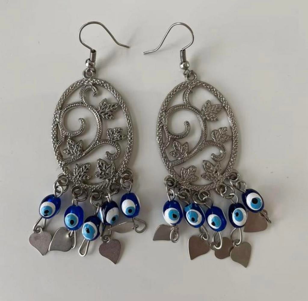 Des boucles d'oreilles, Bijoux, Sacs & Beauté, Boucles d'oreilles, Gris, Comme neuf, Enlèvement, Autres matériaux