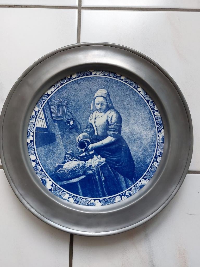 Delfts blauw bord met tinnen rand., Enlèvement