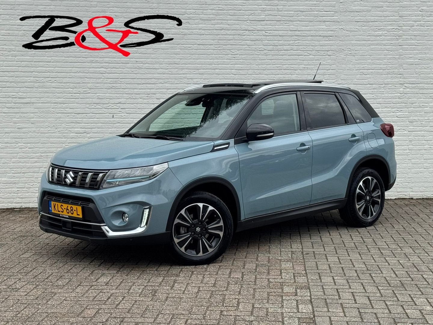 Suzuki Vitara 1.5 Hybrid Style AllGrip Pano Camera Carplay A, Auto's, Suzuki, Automaat, Blauw, Bedrijf, Grijs