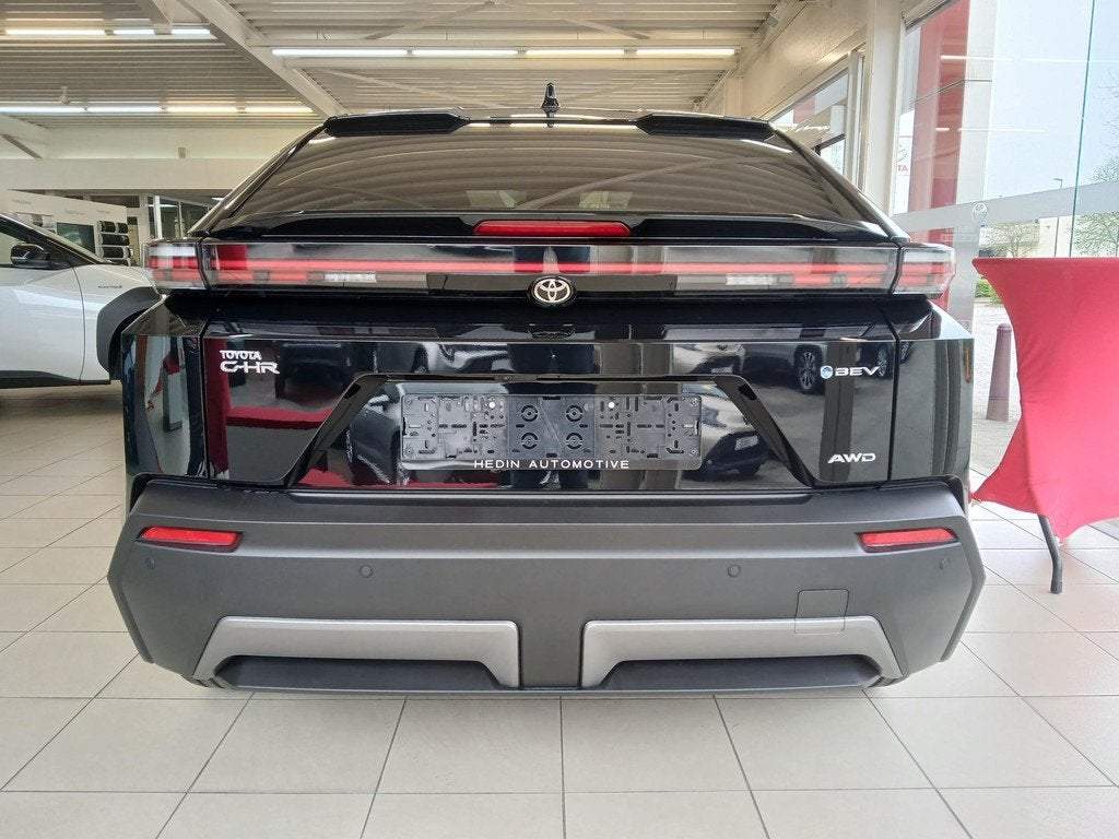 Toyota C-HR+ Style AWD 77KwH, Auto's, Toyota, Automaat, Stof, Overige modellen, Zwart