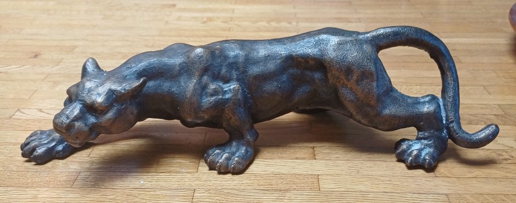 Metalen sluipende roofkat, Ophalen