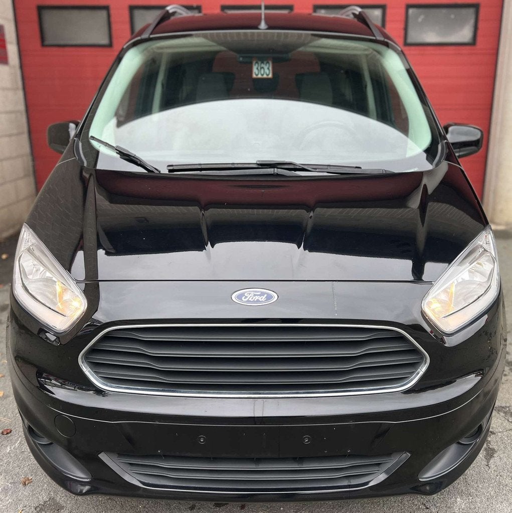 Ford Tourneo Courier 1.0 EcoBoost + CLIM + CAR-PASS + 5 PL, Auto's, Ford, Gebruikt, Euro 6, Zwart, Bedrijf